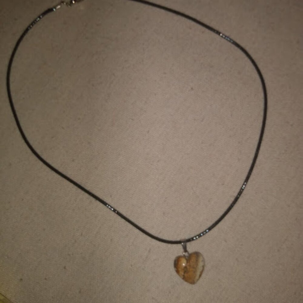 Multi color heart shaped stone pendant necklace.